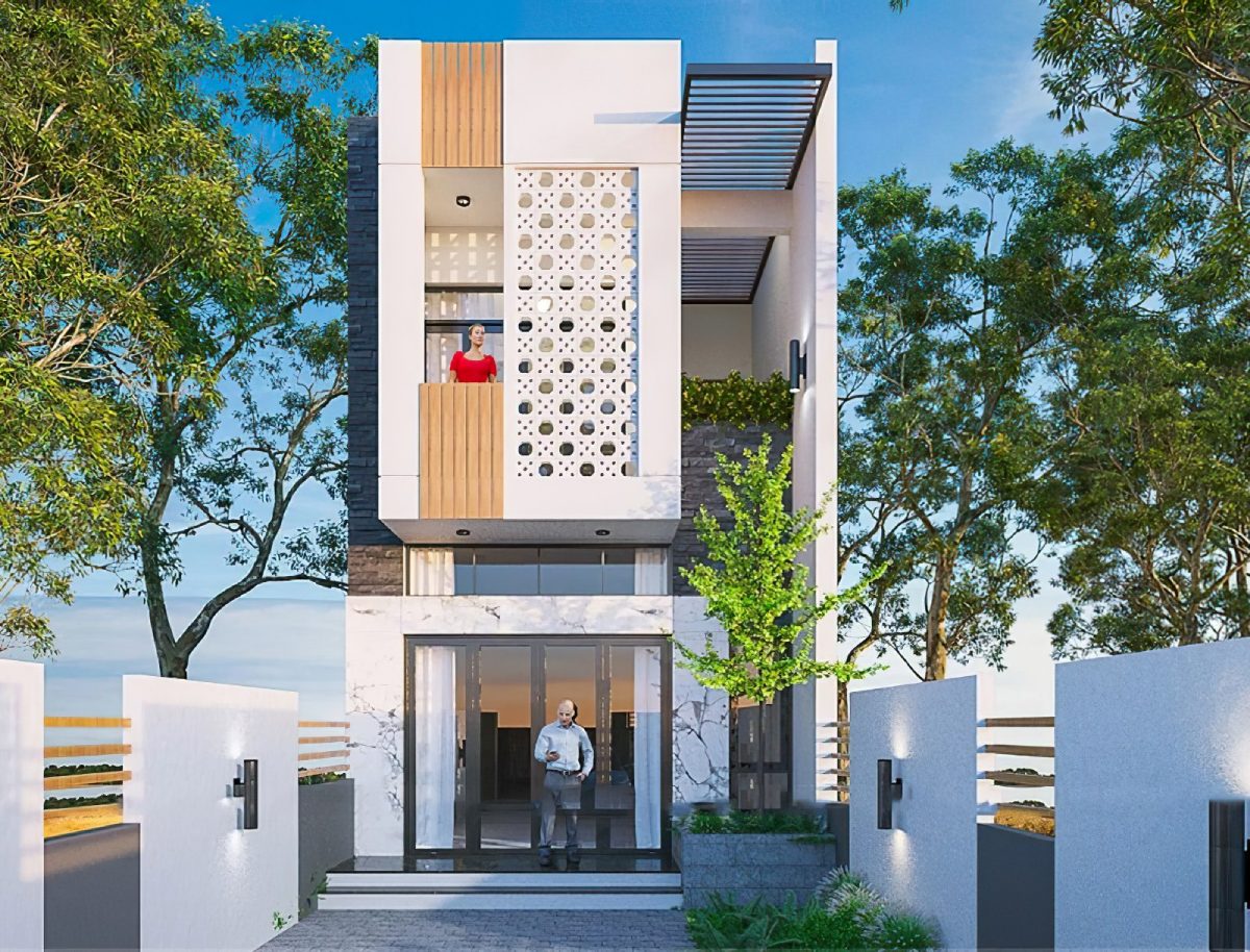 Ngôi nhà hiện đại với ban công, cửa kính lớn và cây xanh xung quanh tạo cảm giác thư thái.