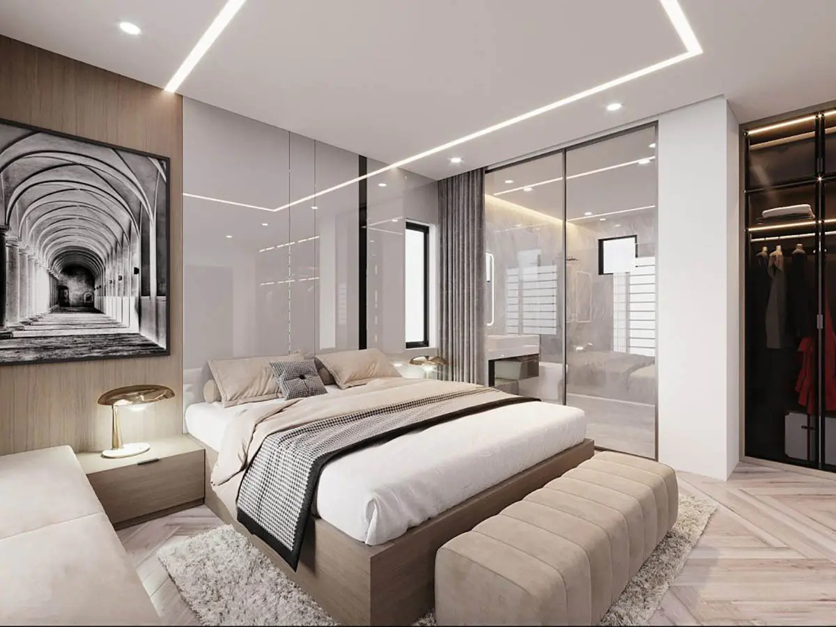 Phòng ngủ hiện đại với nội thất sang trọng, tông màu trung tính và ánh sáng tự nhiên, có tranh treo tường nghệ thuật.