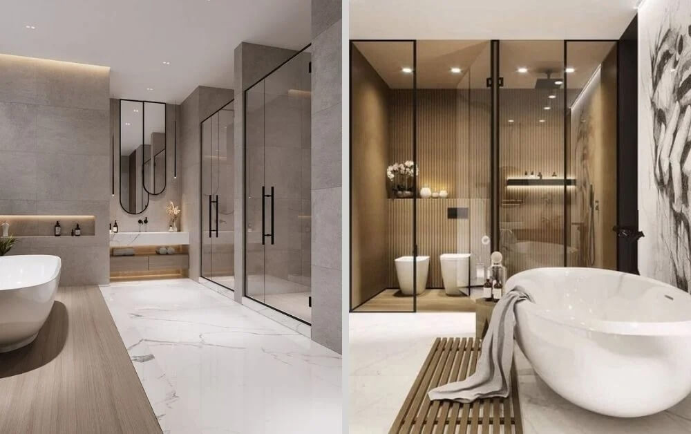 Phòng tắm hiện đại với bồn tắm trắng, vách kính, nội thất sang trọng và sàn lát đá.