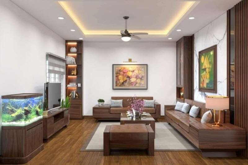 0nbav1d52o9x8ywr3pkz Phòng khách hiện đại với nội thất gỗ, đèn trần, bể cá và tranh treo tường.