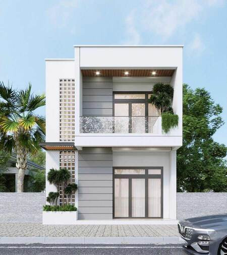 Nhà phố 2 tầng hiện đại với ban công và cây xanh, phong cách thiết kế đơn giản, xen kẽ giữa gạch và kính.