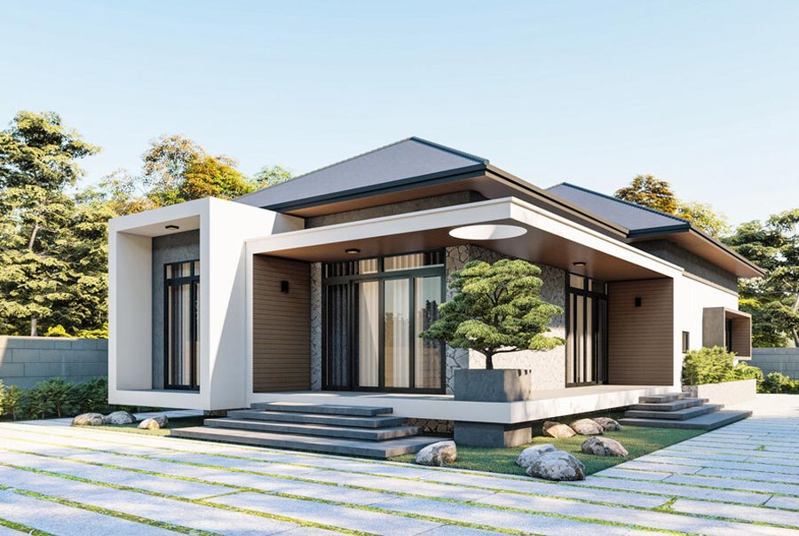 Nhà cấp 4 hiện đại với thiết kế tối giản, mái xéo, bao quanh là vườn cây xanh mát và lối đi sân lát đá.