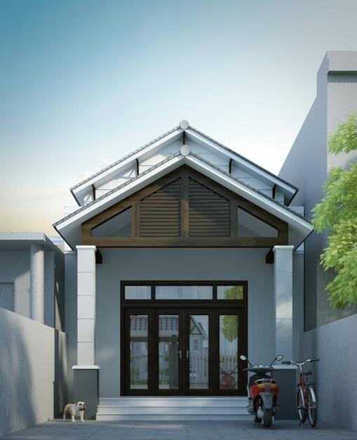 Ngôi nhà cấp 4 hiện đại với mái ngói, cửa kính lớn, có xe máy và xe đạp trước sân.