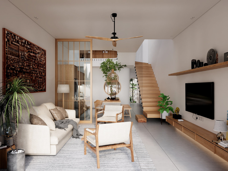 Phòng khách hiện đại với nội thất gỗ, cầu thang gỗ, và cây xanh tạo không gian ấm cúng.