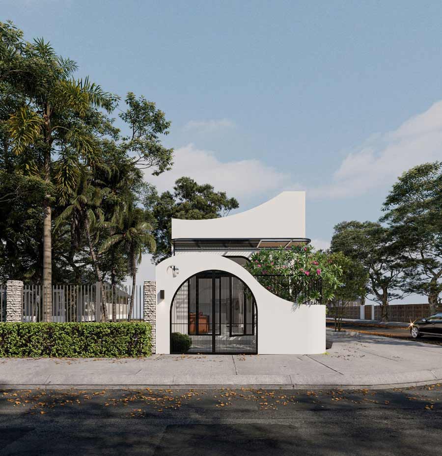 Nhà nhỏ hiện đại với cửa vòm trắng, cây xanh bao quanh, thiết kế thoáng mát.