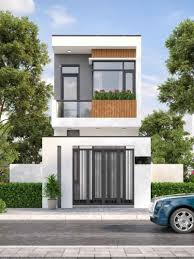 Nhà phố hiện đại hai tầng với cửa kính lớn và cây xanh điểm xuyết, kiểu dáng tối giản thanh lịch.