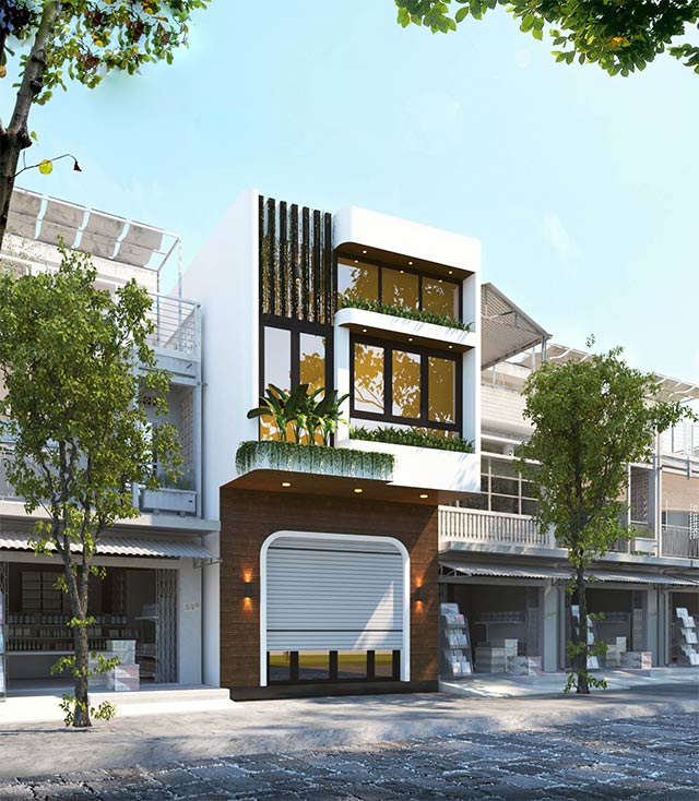 Nhà phố hiện đại 3 tầng với cửa sổ lớn cùng các cây xanh trang trí, nằm giữa khu đô thị sôi động.