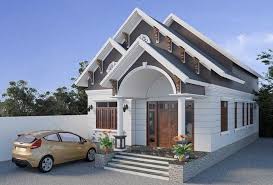 Tòa nhà hiện đại một tầng với mái dốc, xe hơi đậu bên cạnh dưới nền trời trong xanh.