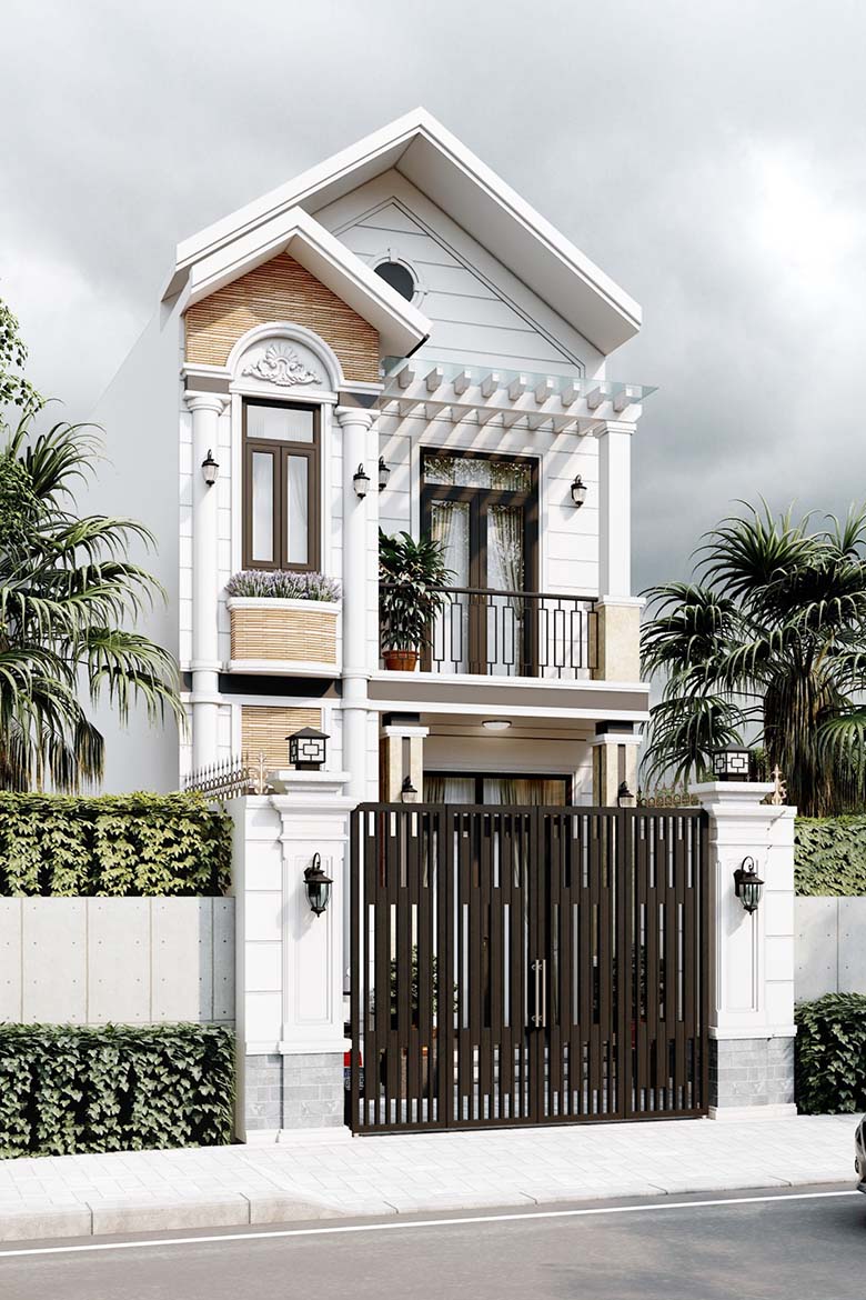 Nhà phố hiện đại hai tầng với cổng sắt trang trọng, cây xanh phía trước, cùng bầu trời xám.