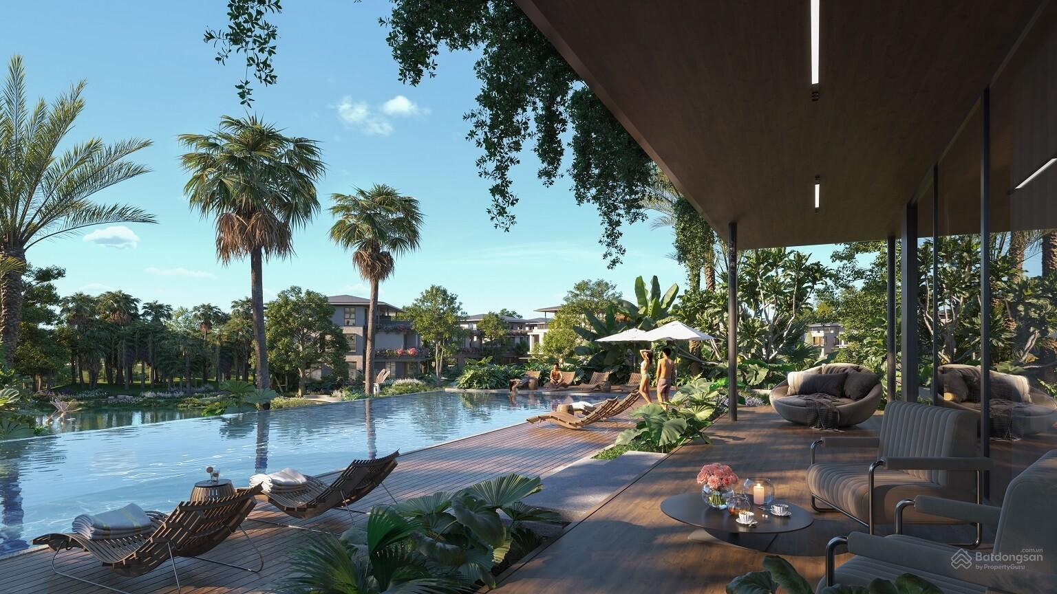 20241025114039-a02f_wm Hồ bơi ngoài trời với ghế dài, cây cọ và căn nhà hiện đại tạo không gian thư giãn sang trọng.