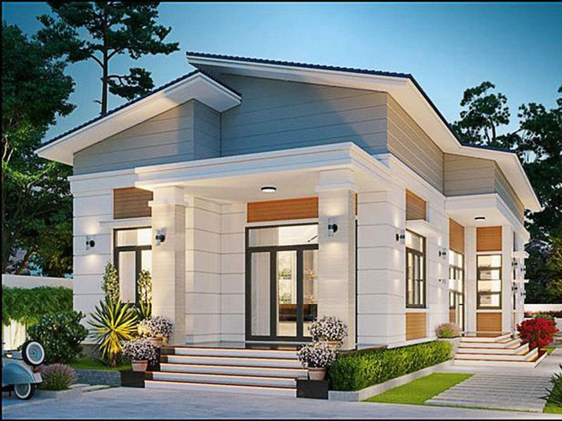 Nhà cấp 4 phong cách hiện đại với cửa kính lớn và sân vườn tạo điểm nhấn giữa không gian cây xanh mát mẻ.