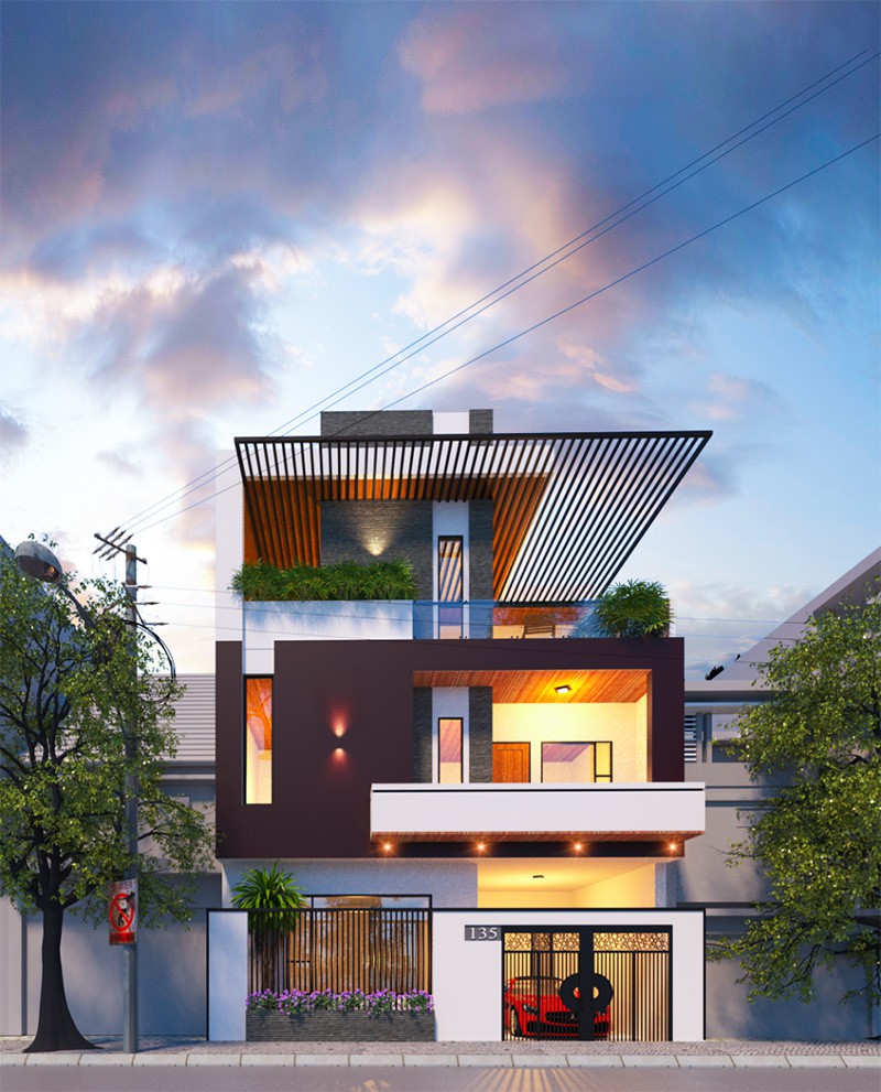 Nhà phố hiện đại ba tầng với ban công xanh và ánh sáng chiều, mặt tiền sang trọng.