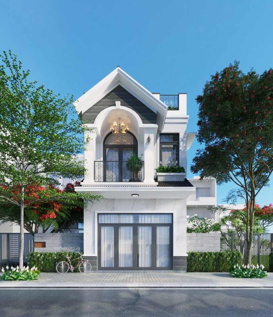 Nhà phố hiện đại hai tầng với cây xanh và xe đạp phía trước, bầu trời sáng trong.