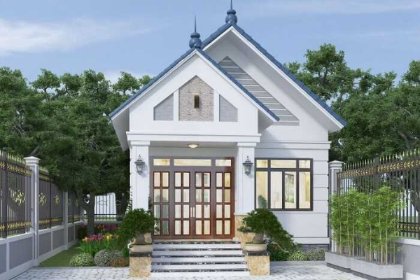 Nhà cấp 4 với mái thái, sân vườn, hàng rào trang trí, porte, vây quanh là cây xanh, kiến trúc hiện đại.