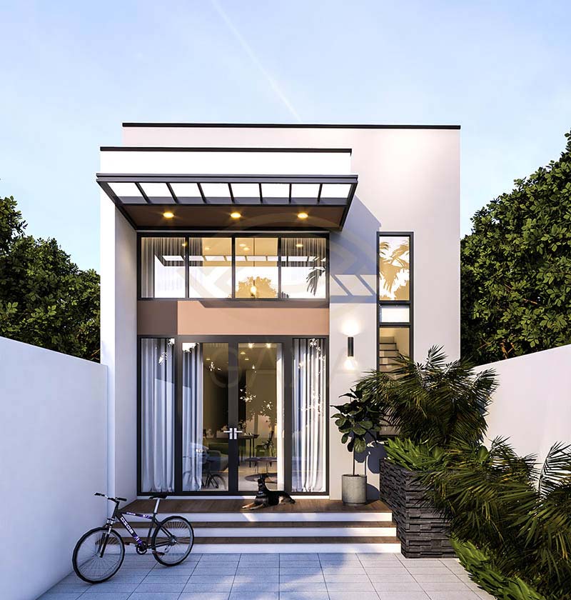 Nhà hiện đại hai tầng với cửa kính lớn, cây xanh trước sân, và xe đạp bên cạnh lối vào.
