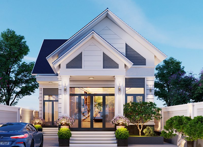 Ngôi nhà một tầng với mái ngói, cây xanh và ô tô phía trước, khung cảnh sáng sủa và hiện đại.