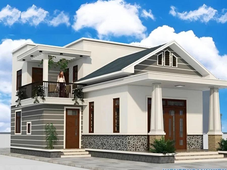 Ngôi nhà hai tầng hiện đại với ban công và cây xanh, dưới bầu trời xanh và mây trắng.