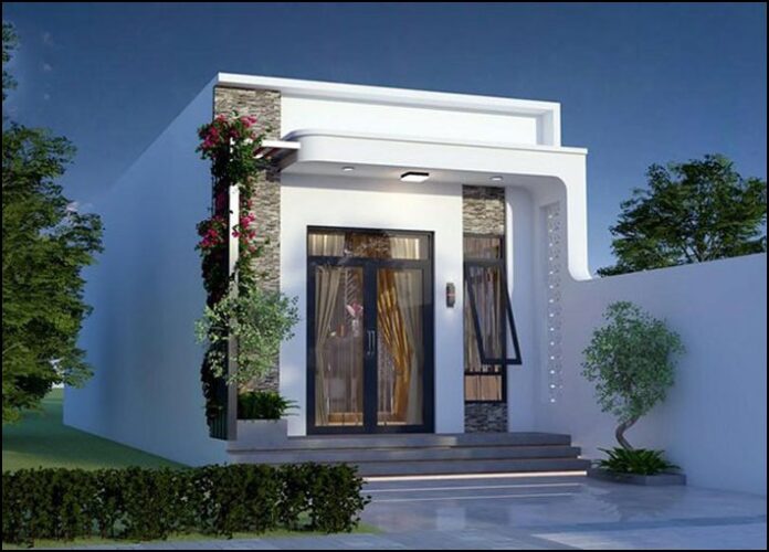 Ngôi nhà cấp 4 hiện đại mang thiết kế tinh tế và thân thiện với thiên nhiên, mặt tiền được điểm xuyết bởi cây xanh và hoa.