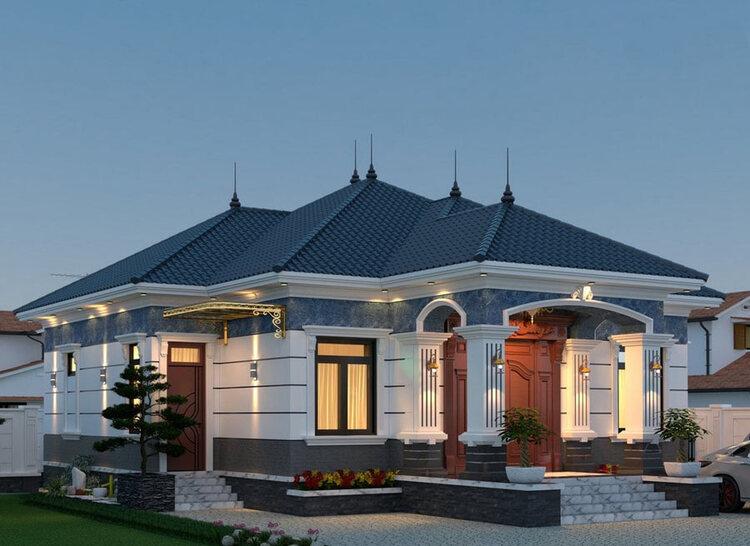 Biệt thự một tầng phong cách châu Âu sang trọng với mái ngói xanh, ánh sáng lung linh vào buổi tối.