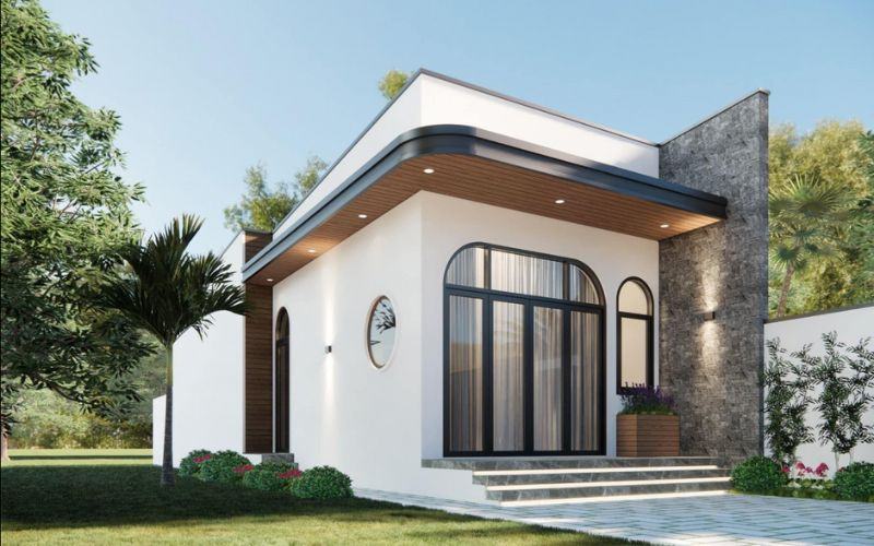 Nhà hiện đại cấp 4 với mái phẳng, cửa sổ kính rộng mở, sân vườn xanh mướt, thiết kế thanh lịch, lý tưởng cho gia đình.