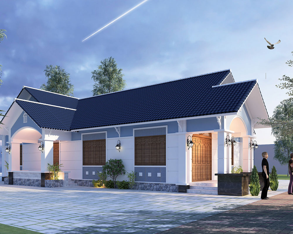 Ngôi nhà một tầng thiết kế hiện đại với mái ngói xanh, ánh sáng buổi chiều tối tạo không gian yên bình.