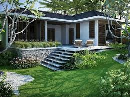 Biệt thự hiện đại với thiết kế sân vườn xanh mát, lối vào bằng đá, cây cảnh xung quanh.