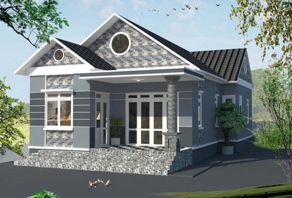 Ngôi nhà cấp 4 mái thái hiện đại, thiết kế tinh tế, màu xám, bao quanh bởi cây xanh, bầu trời xanh trong.