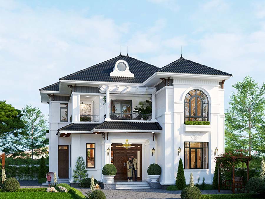 Ngôi nhà hai tầng hiện đại với mái ngói đen, cửa sổ lớn và cây xanh xung quanh.