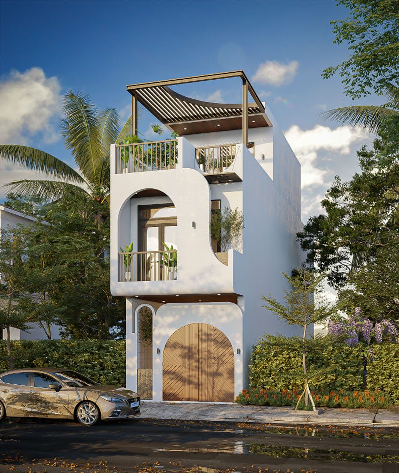 Nhà phố hiện đại với thiết kế bo tròn, mái che rộng và xe hơi đậu phía trước, xung quanh là cây xanh.