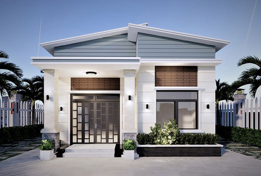 Nhà mái lệch hiện đại với mặt tiền mở, cửa kính lớn, cây xanh mát rượi trước sân, ánh sáng tự nhiên bao phủ.