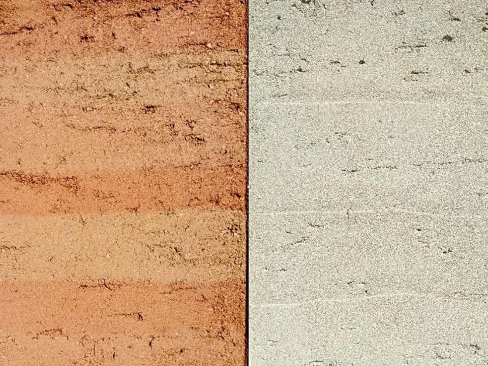 Hai bề mặt đất khác màu: nâu đỏ và xám trắng, thể hiện sự khác biệt về cấu trúc và màu sắc.