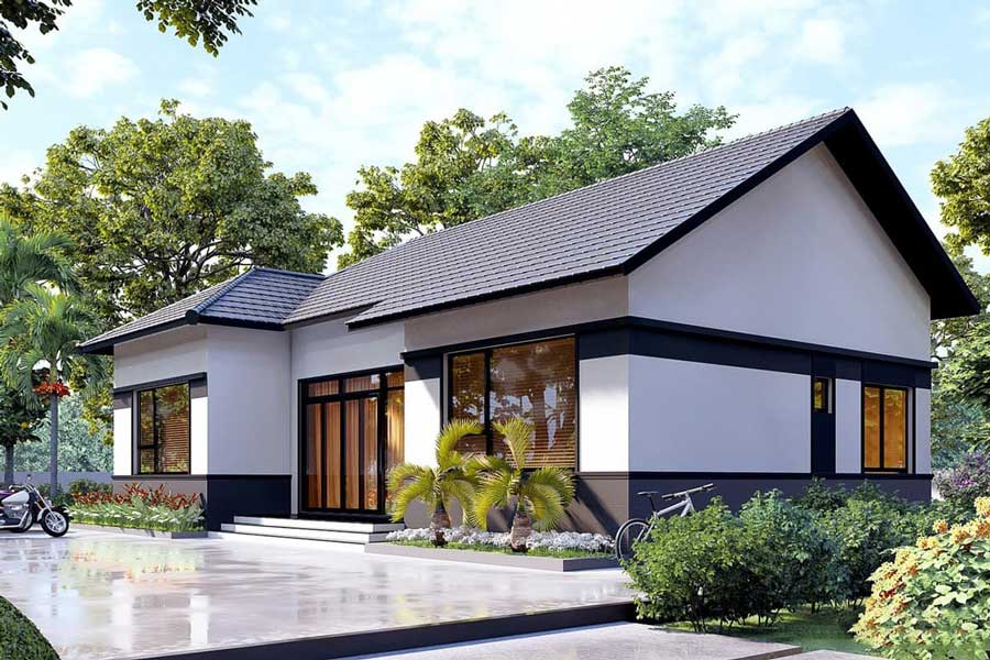 Ngôi nhà một tầng hiện đại với mái ngói đen, cửa sổ kính lớn, cây xanh bao quanh.
