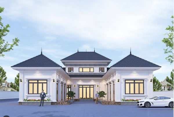 Biệt thự ba tầng hiện đại, với chiếc xe hơi trắng đậu trước và hai người đứng cạnh cửa.