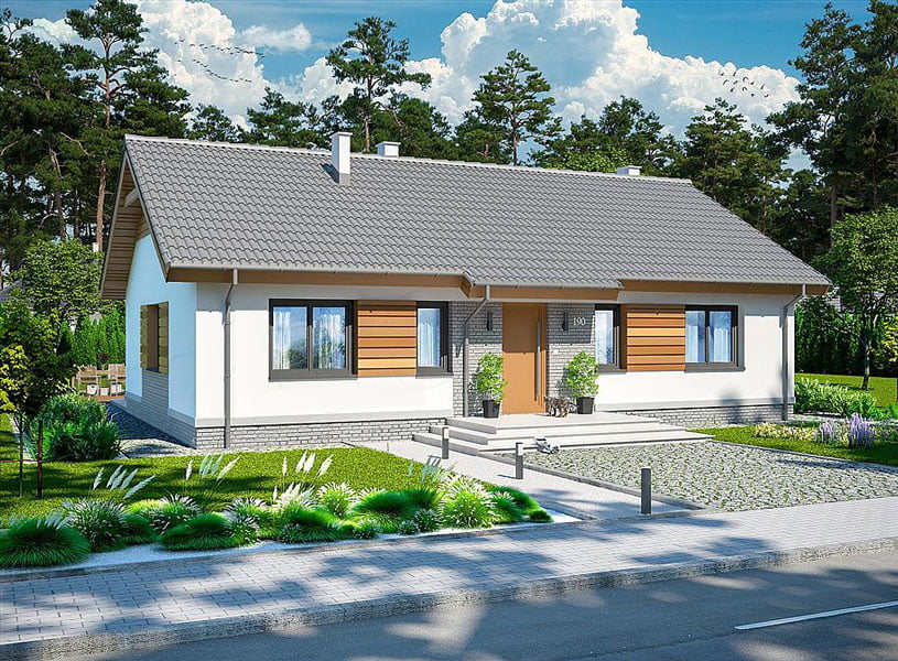 Nhà một tầng mái ngói xám, sân vườn xanh tươi, bên cạnh khu rừng, trời trong xanh với mây trắng.