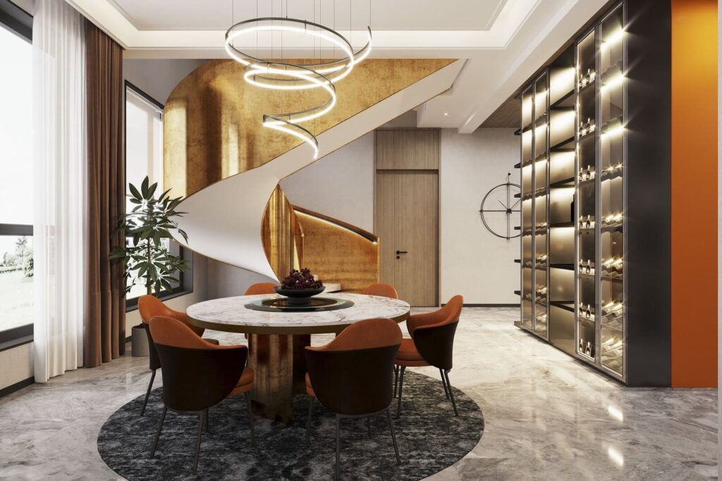 Phòng ăn hiện đại với bàn tròn, ghế cam, cầu thang xoắn vàng và tủ rượu sang trọng.