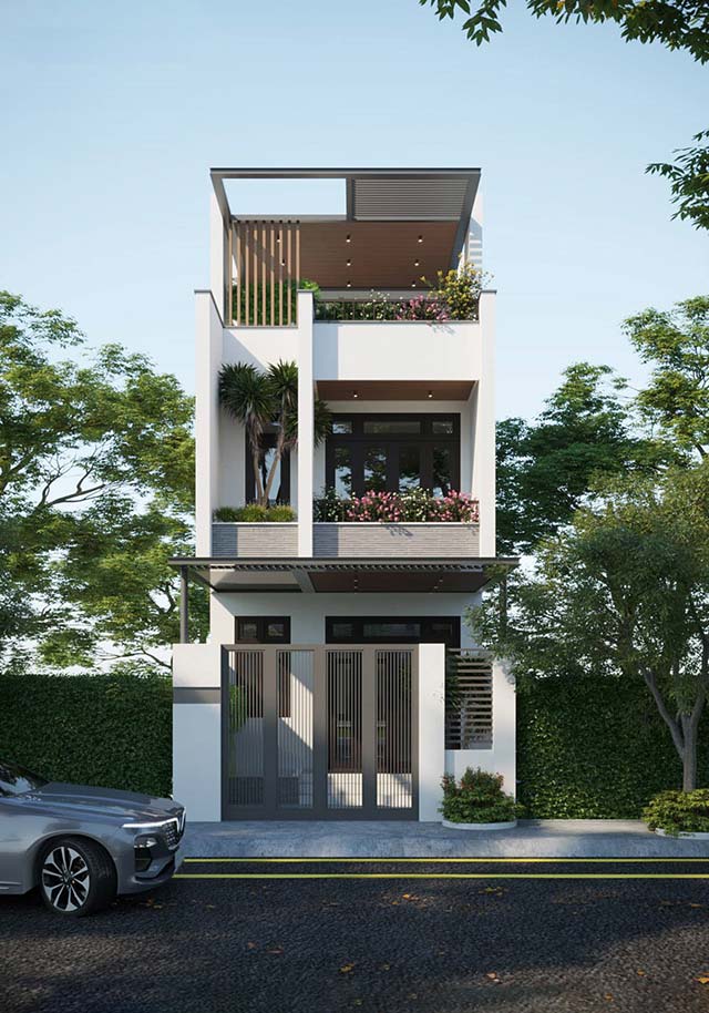 Nhà phố hiện đại 3 tầng với ban công xanh thoáng mát và ô tô đậu phía trước.
