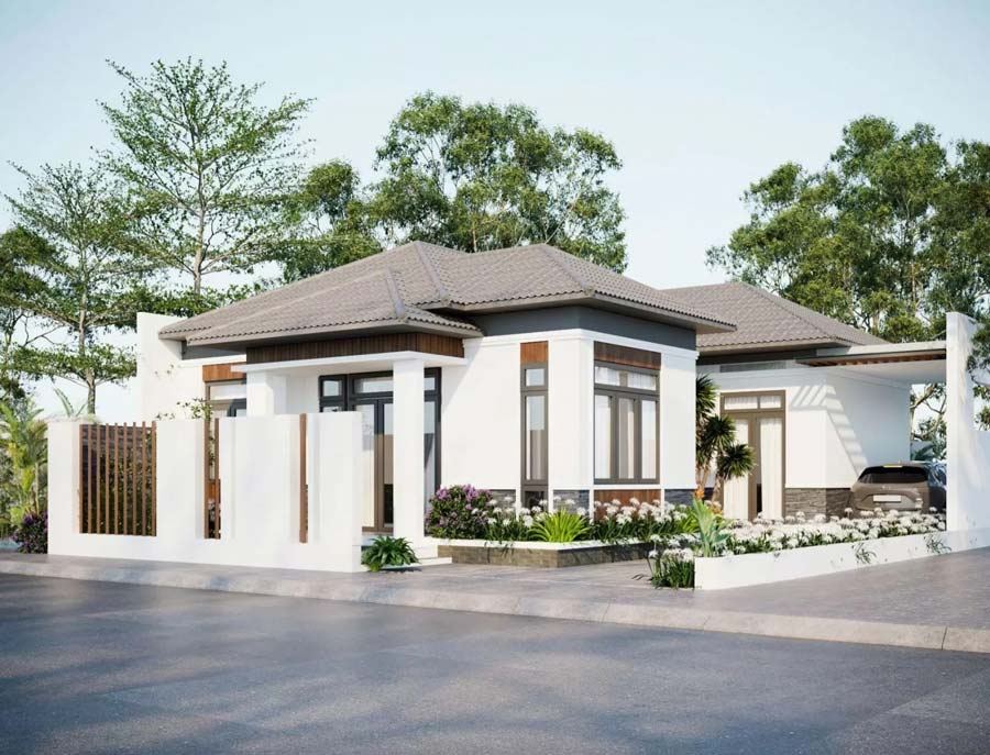 Ngôi nhà mái Thái hiện đại, màu trắng, sân vườn rộng, bao quanh bởi cây xanh, tạo không gian sống thoải mái.