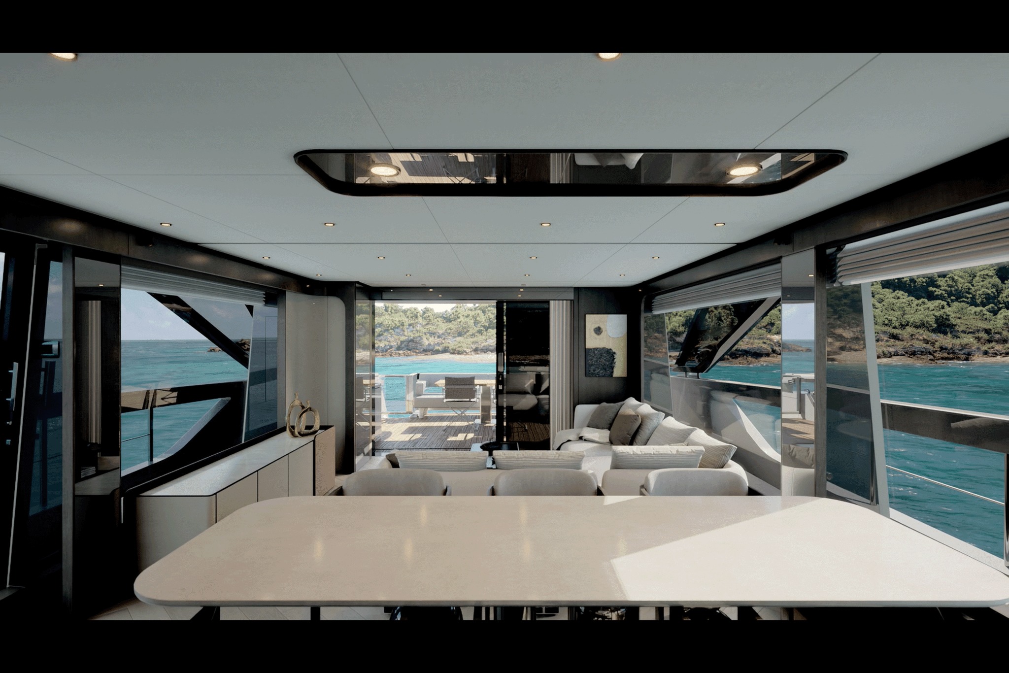 Nội thất sang trọng trên du thuyền với tầm nhìn ra biển xanh và rừng cây, không gian rộng rãi và tiện nghi.