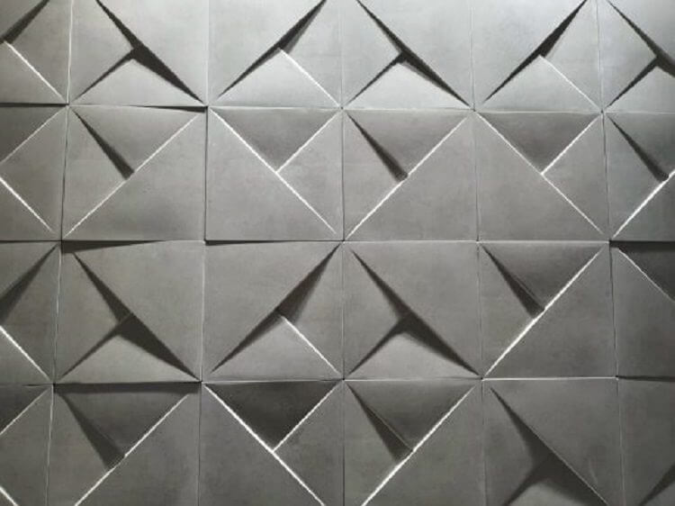 6lxzmdcq3gfbutha049r Tường ốp gạch 3D màu xám, thiết kế hình học, tạo hiệu ứng ánh sáng và bóng đổ độc đáo.