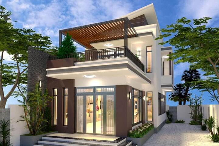 Ngôi nhà hiện đại hai tầng với ban công và cây xanh xung quanh, thiết kế mái lệch đầy phong cách.