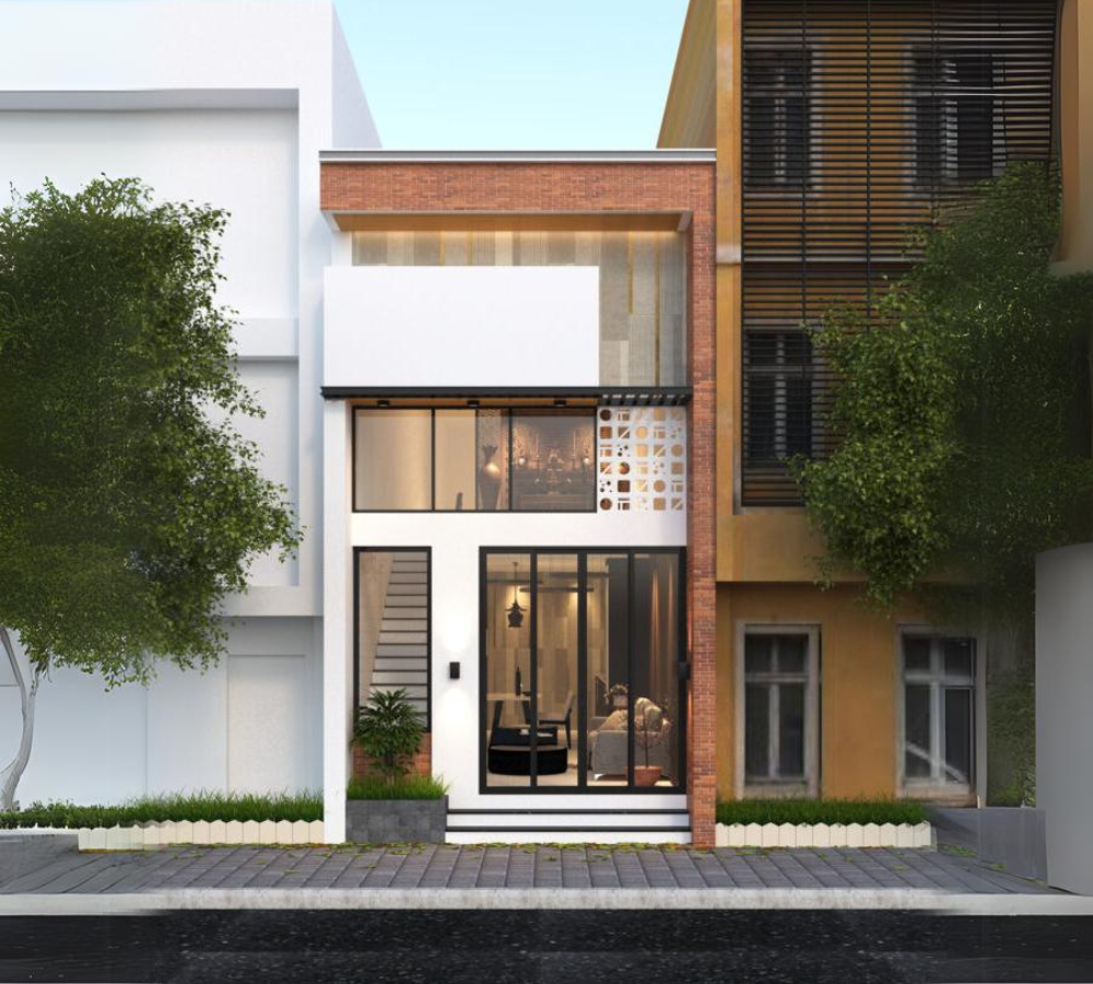 Nhà phố phong cách hiện đại với cửa kính lớn và cây xanh trang trí, mặt tiền cuốn hút giữa đô thị sầm uất.