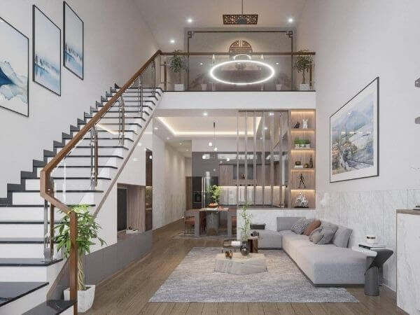 7x3r8nqpo4ivctb0mlu1 Phòng khách hiện đại với ghế sofa màu xám, cầu thang gỗ và đèn trần tròn sáng tạo.