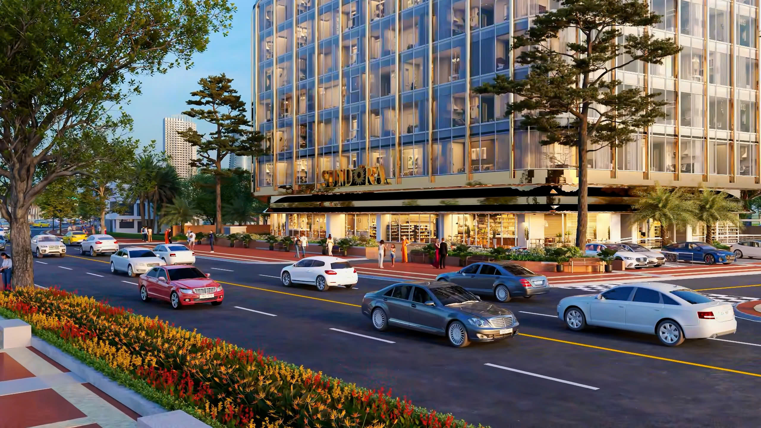 8-13 Tòa nhà hiện đại với xe cộ chạy trên đường, cây xanh bên lề, cảnh đô thị nhộn nhịp vào ban ngày.