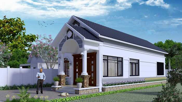 Nhà cấp 4 mái ngói xanh hiện đại, sân vườn rộng, cây xanh và bầu trời xanh.