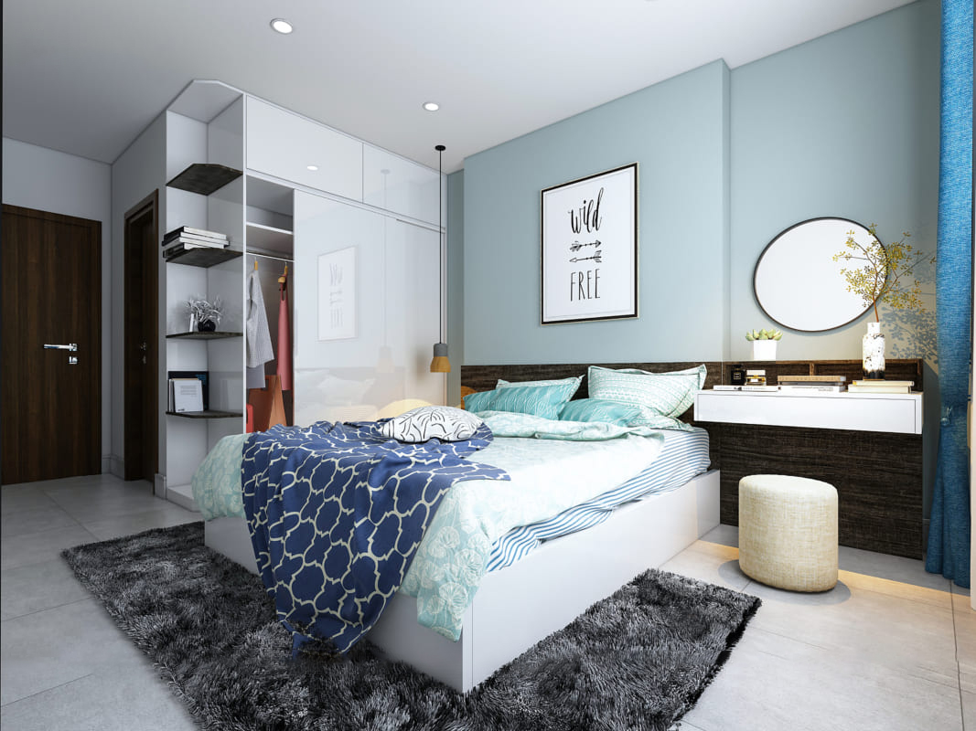 Phòng ngủ hiện đại với giường màu xanh, kệ trang trí và đèn treo, mang lại cảm giác thư giãn.
