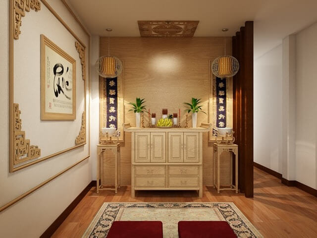 Phòng thờ gỗ truyền thống với tủ thờ, lục bình và đèn treo trang trí, tạo không gian ấm cúng và tâm linh.