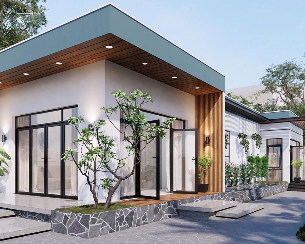 Nhà hiện đại một tầng với cửa kính lớn và cây xanh xung quanh, thiết kế tối giản và sang trọng.