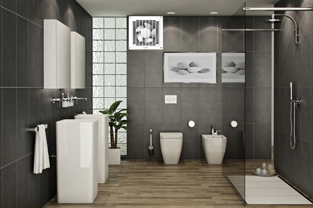 Phòng tắm sang trọng với nội thất hiện đại, gạch màu tối, bồn rửa, bồn cầu và vòi sen.