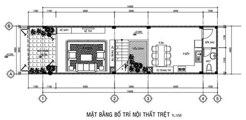Sơ đồ mặt bằng nội thất tầng trệt với phòng khách, bếp, nhà vệ sinh. Bố trí không gian tiện nghi và hiện đại.