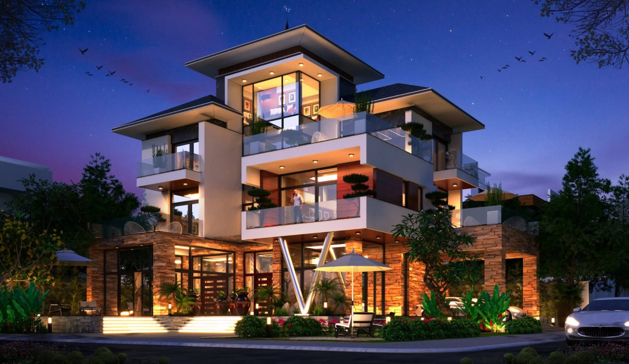 Biệt thự hiện đại với kiến trúc tinh tế và ánh đèn lung linh vào buổi tối, cây cối xanh tươi xung quanh.